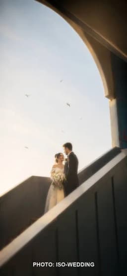 Wedding couple on Galata Bridge with Istanbul skyline